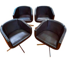 Set of four 21st-century “Tulip Sixty” Swivel Armchairs in Leather and Chrome