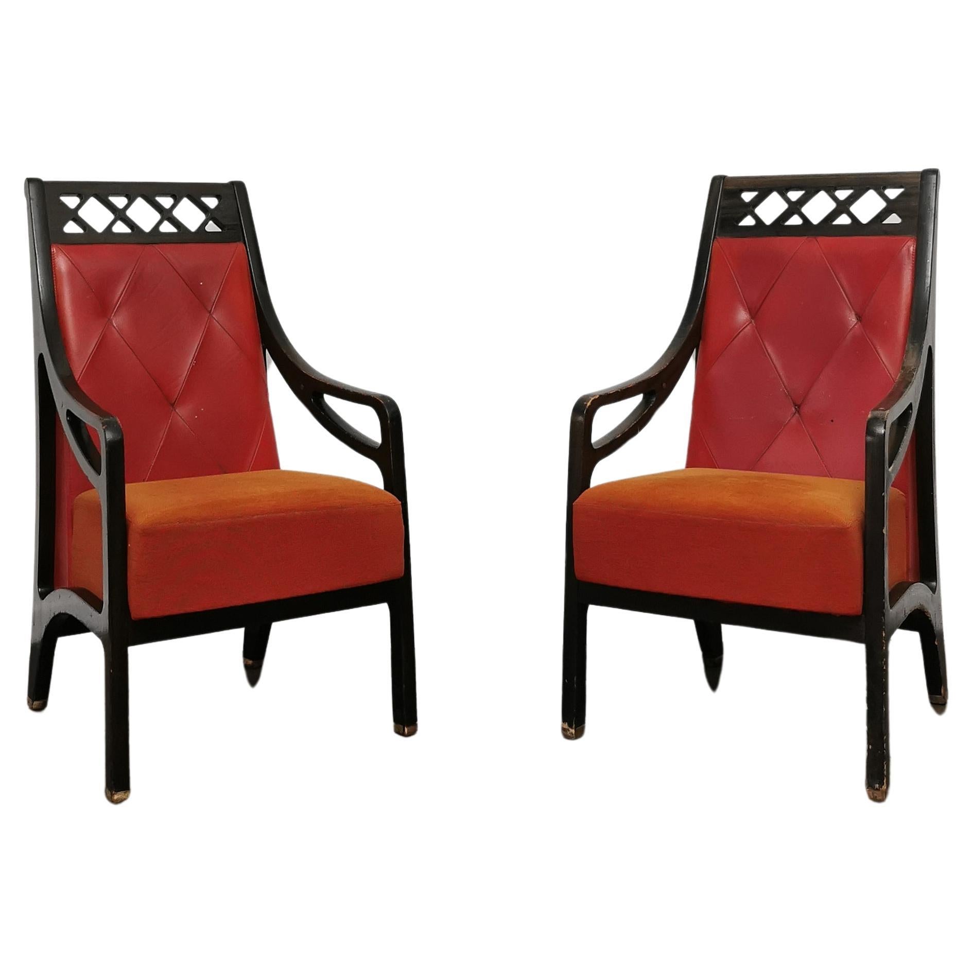 Set of 2 rare armchairs produced in Italy in the 1930s/40s, which were found in an ancient villa in Palermo. Each single armchair with a particular line was made with a solid wood structure, a striped velvet seat and a red leather backrest on the