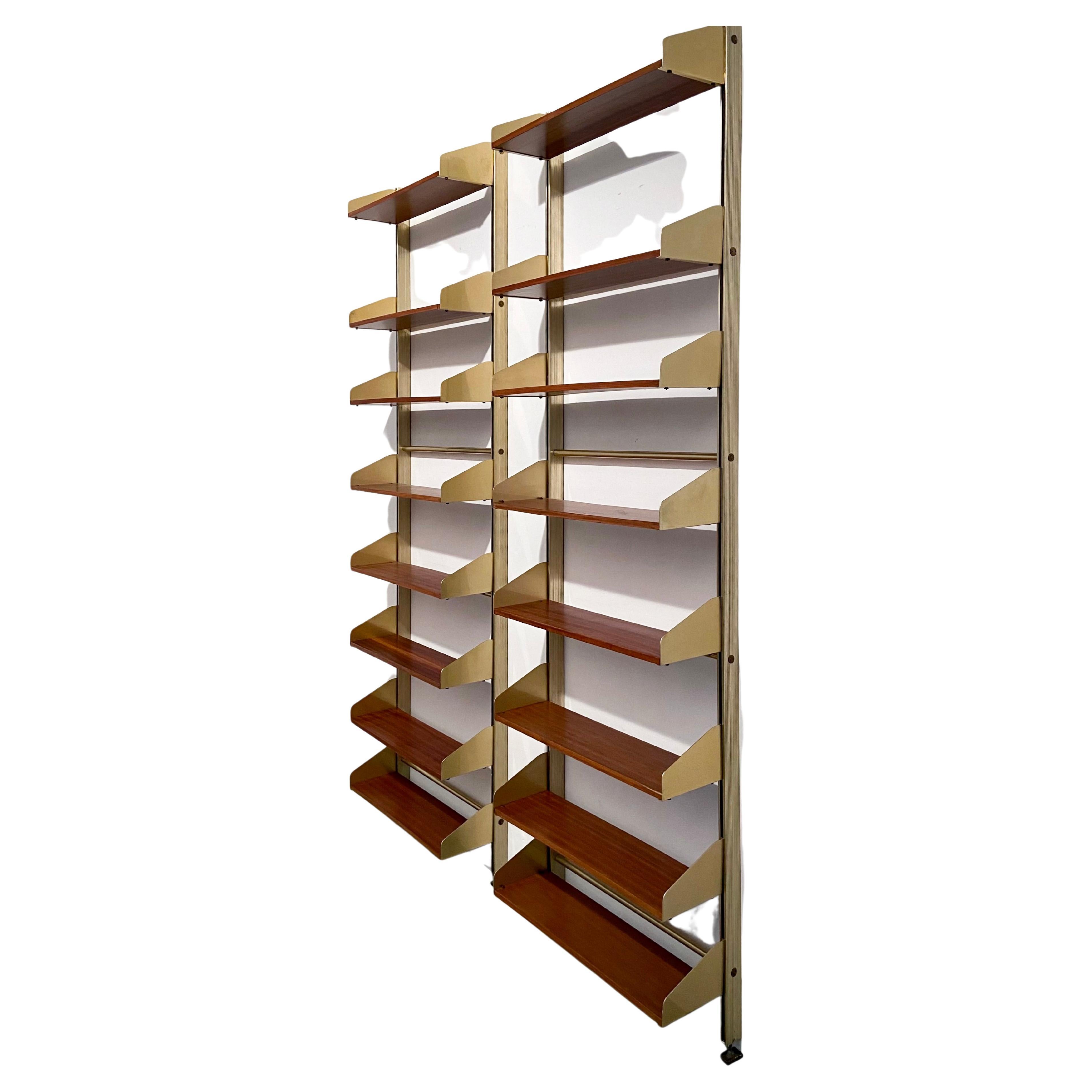 Two ‘S2’ bookshelves in anondised gold aluminium, brass and wood by FEAL (Fonderie Elettriche Alluminio e Leghe), Italy, 1957.

These bookshelves have been built cleverly. The shelves are adjustable by a moving them up or down and click them in. The