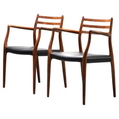 Niels Otto Mølller, ensemble de deux chaises 62 en palissandre et cuir, Danemark, années 1960