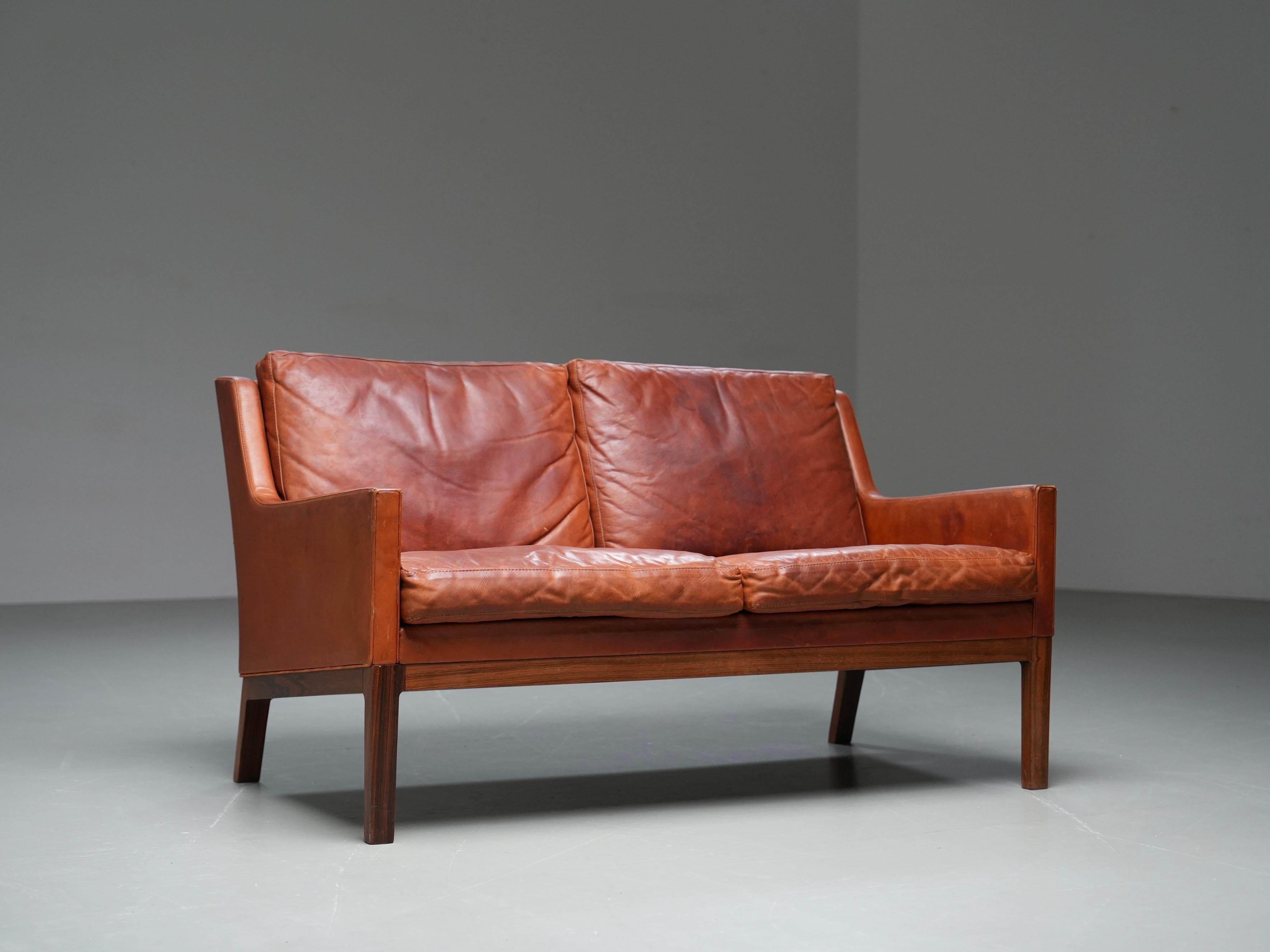 20th Century Kai Lyngfeldt Larsen 2 seat sofa in cognac patinated leather, Denmark, 1960’s For Sale