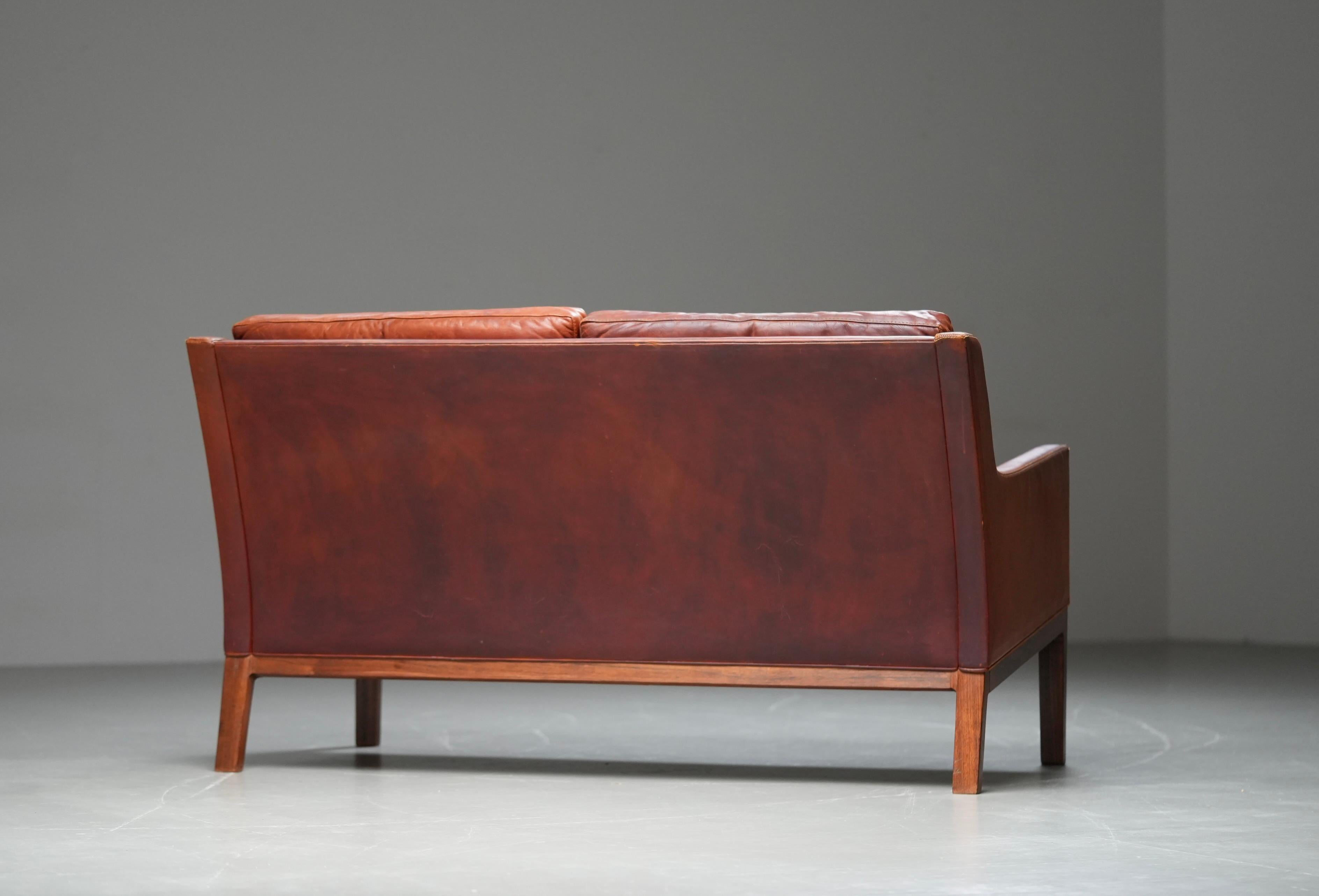 Kai Lyngfeldt Larsen 2 seat sofa in cognac patinated leather, Denmark, 1960’s For Sale 2
