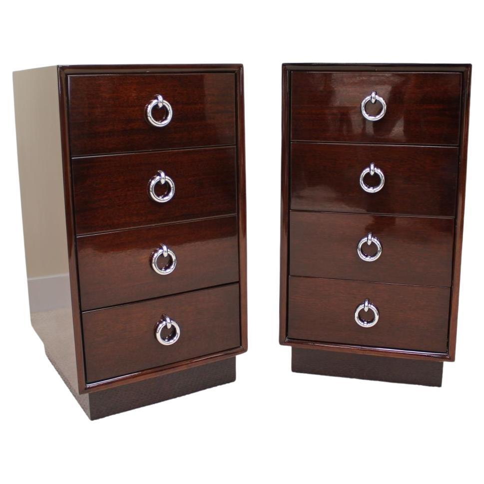 Professionally restored pair of tall Machine-Age Art Deco Bachelor Chests with Chrome Hardware. These gorgeous cabinets have four drawers for ample storage, but the true highlight is of these cabinets are the extraordinary polished chrome door