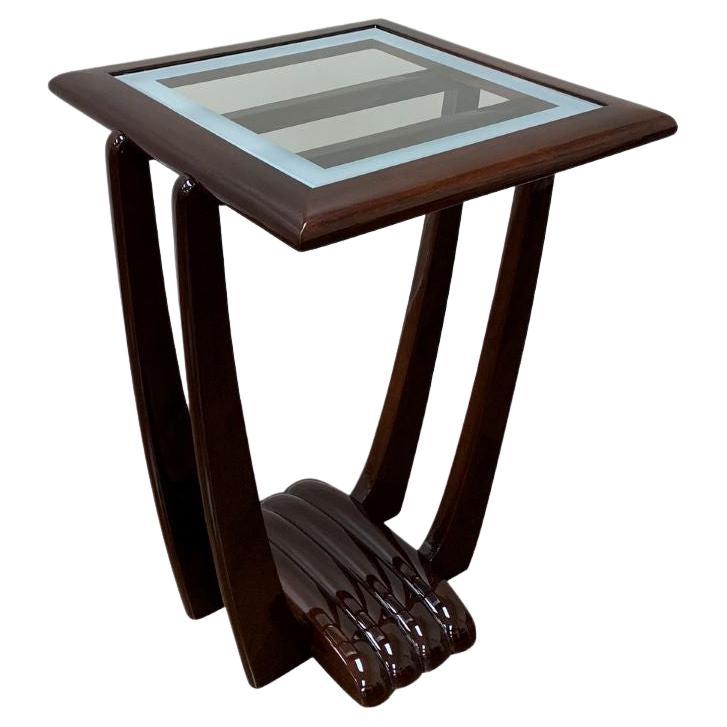 American Art Deco scalloped-base end table. Elegant design with slightly curving legs into a scalloped base in a walnut gloss finish. The new glass top has a beautiful frosted edge to highlight the gorgeous base of this table. Measures: Height 25,