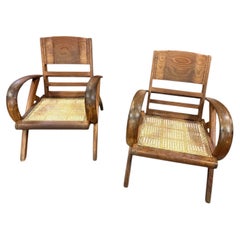 Par de sillas francesas de estilo Art Déco de nogal ceruso, atribuidas a René Gabriel, hacia 1940