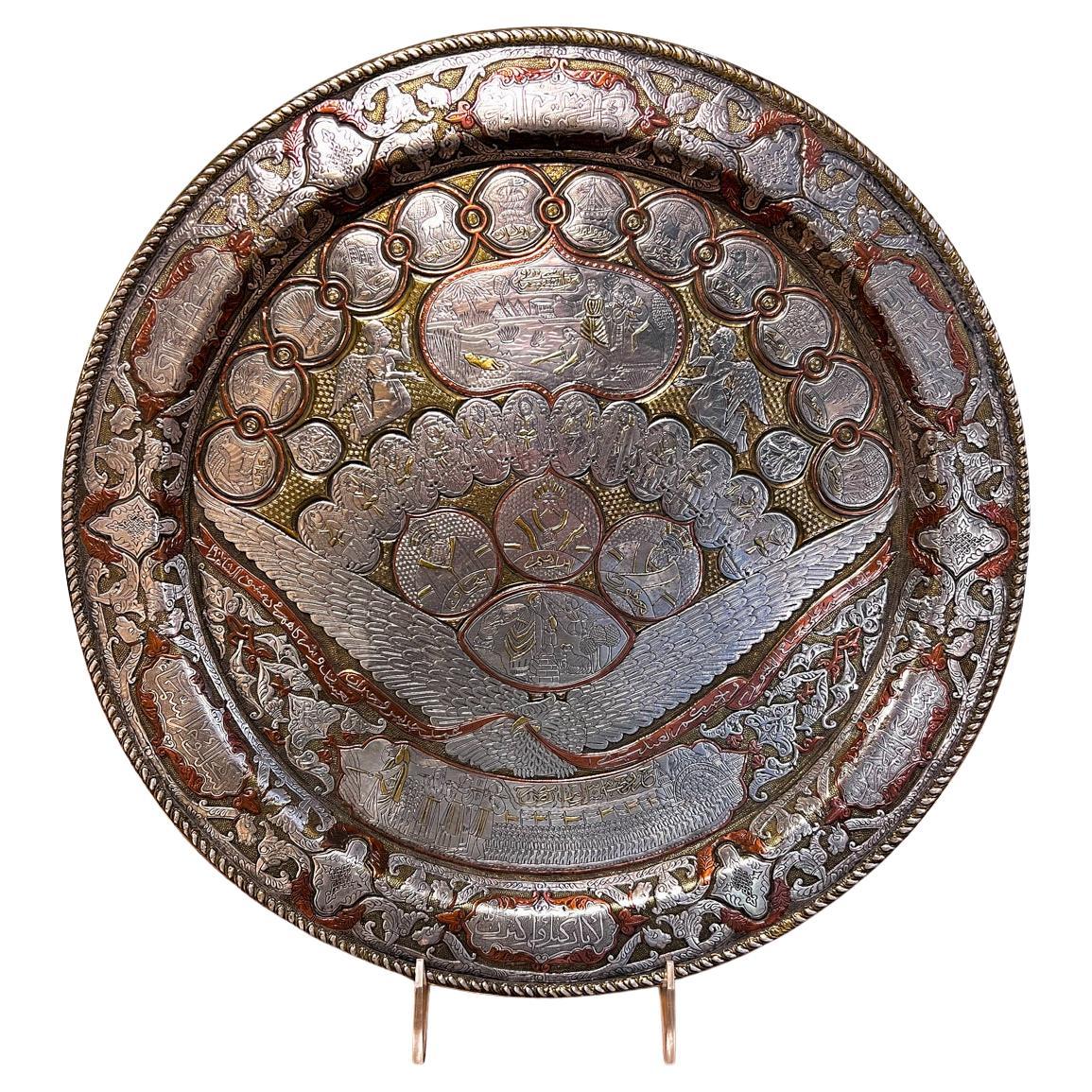 A Damascened Silver, Copper and Gold Plate with Old Testament Scenes 