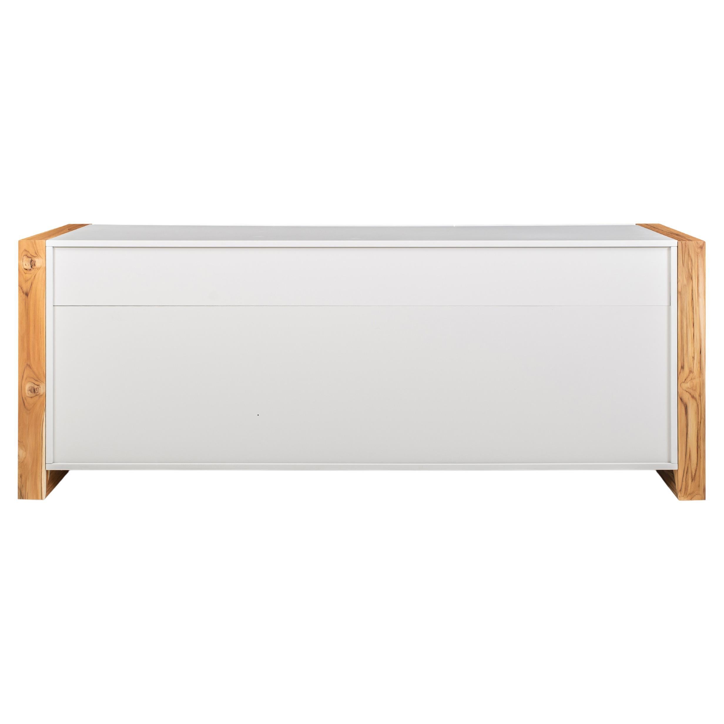 The Masp sideboard in an off-white finish and teak end frames, was created by our Uultis Design team for the purpose of storage since it is a piece that can be used for the dining room space. This beautiful sideboard comes in an off-white color