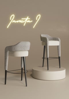 Taburete de bar Invicta: Tejido tapizado, patas lacadas, diseño moderno