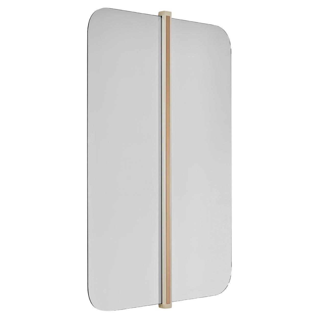 GABRIEL mirror with brass color detail on center and rounded ends For Sale