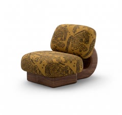 Orla Armchair Upholstered in fabric Tiger Mountain and walnut structure