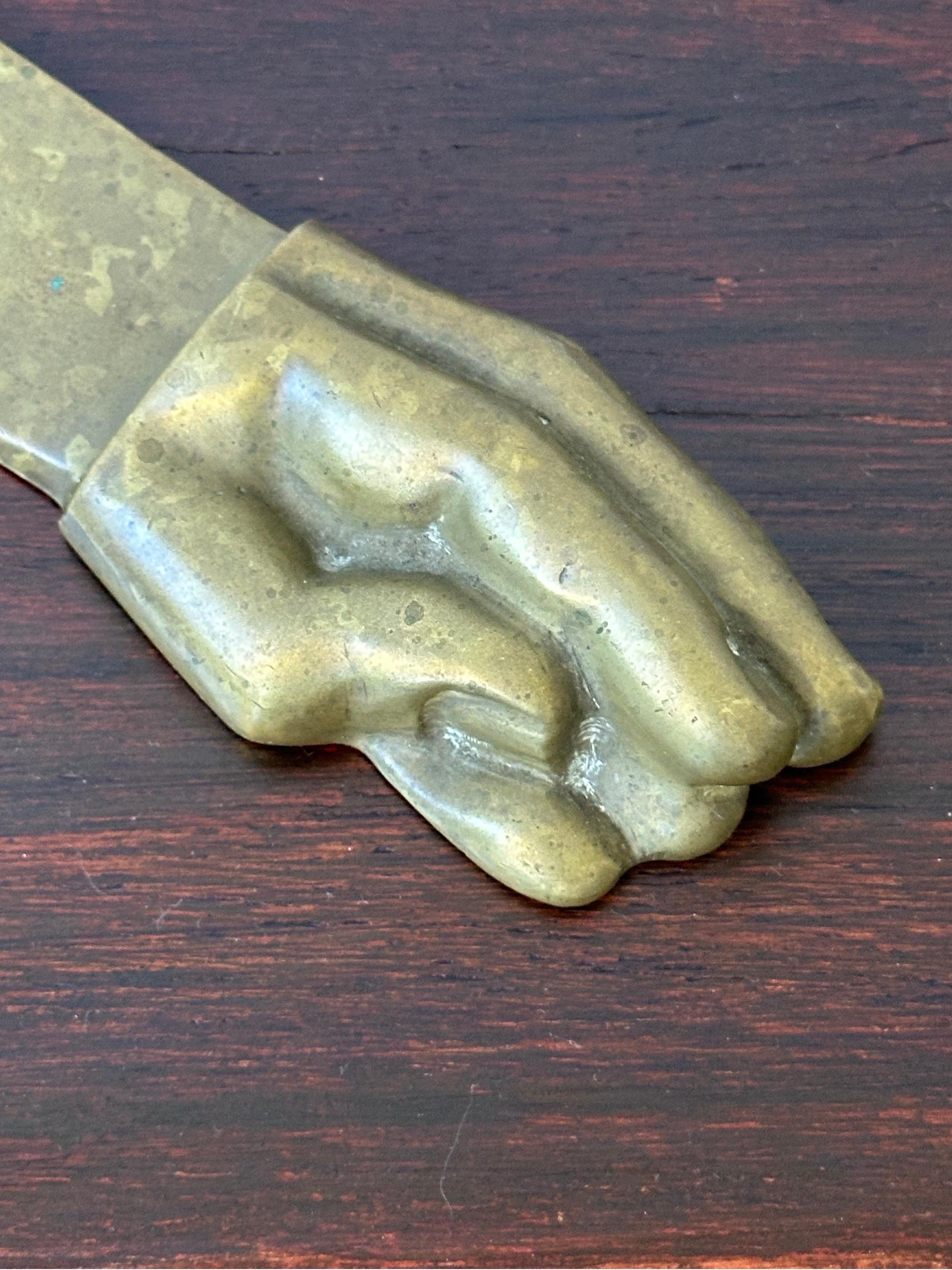Bronze sculpted letter opener with a handle resembling a hand by Brazilian artist and sculptor Pietrina Checcacci, 1970s.