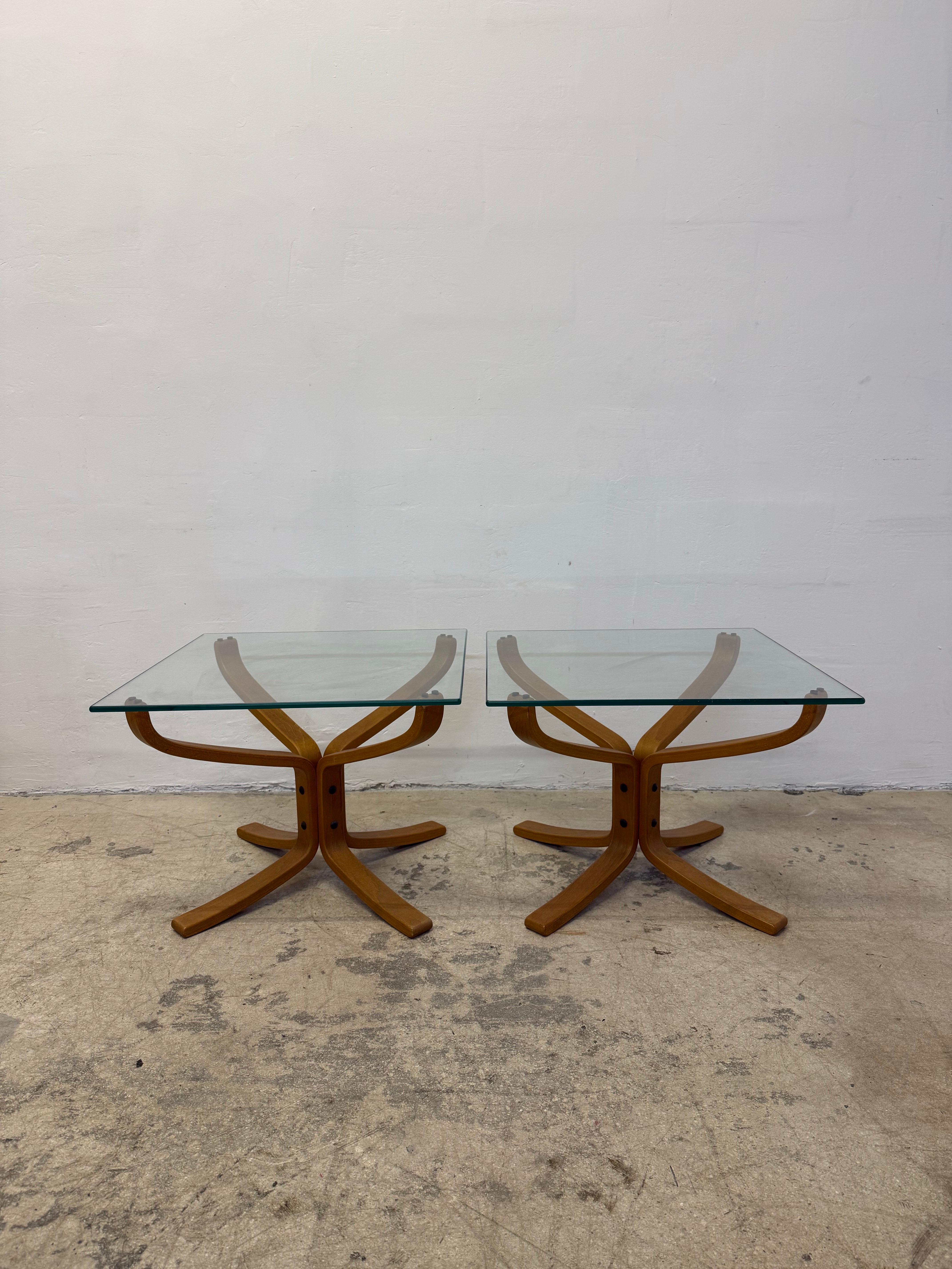 Pair of Sigurd Russell Falcon square glass top side tables on beech wood bases for Vante Møbler circa 1960s.