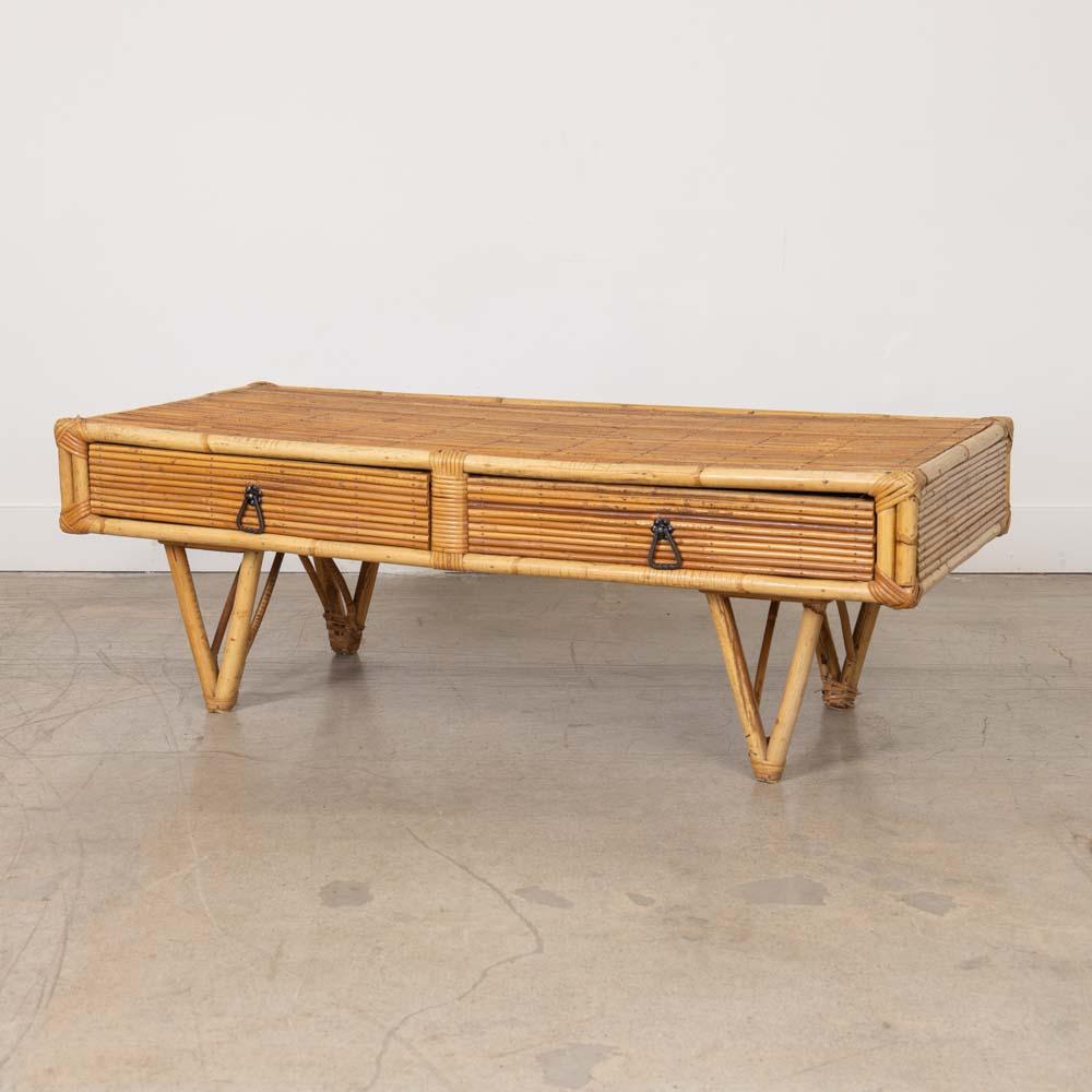 Great rectangular rattan coffee table from France, 1960s. Bamboo and rattan frame with two drawers on four tapered bamboo feet. Original rattan shows nice age and patina. Functional and unique design. 