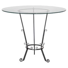 Mesa de centro española de hierro forjado y cristal