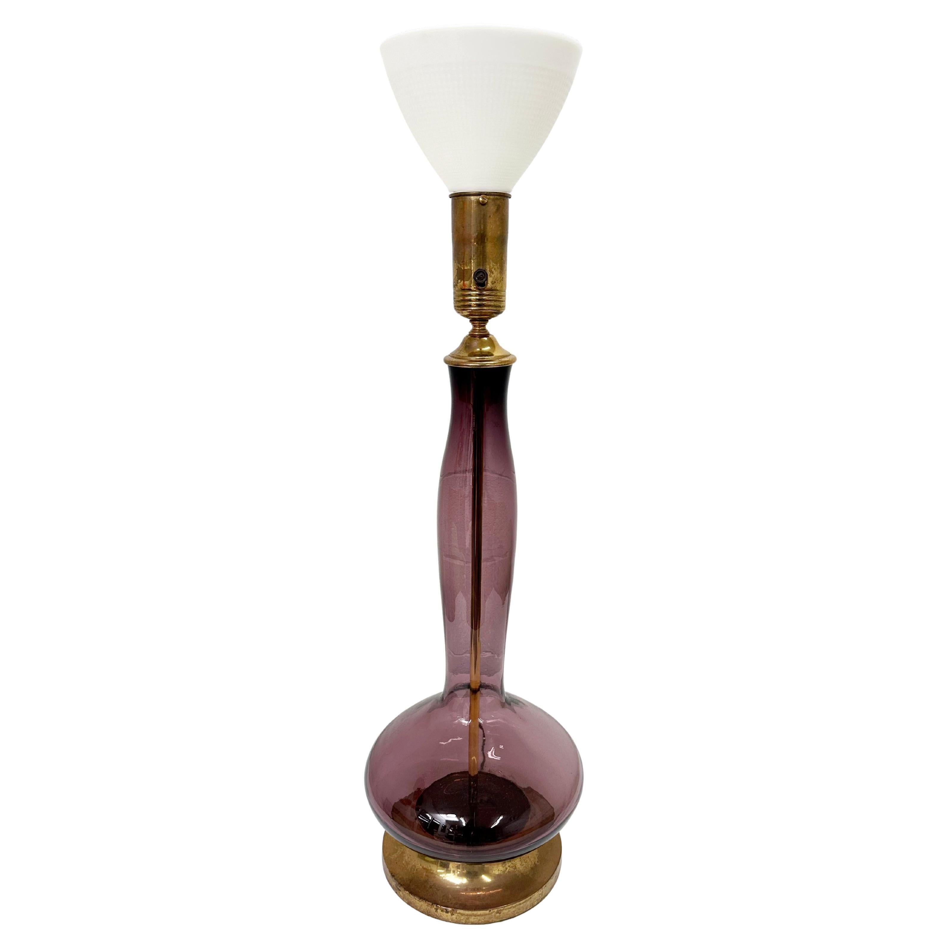 A strikingly scaled and rare example of mid-century American glass design, this monumental Model #5815-L decanter by Wayne Husted for Blenko Glass Company was introduced in 1958 and produced in 1958-59 as part of Husted’s visionary Architectural