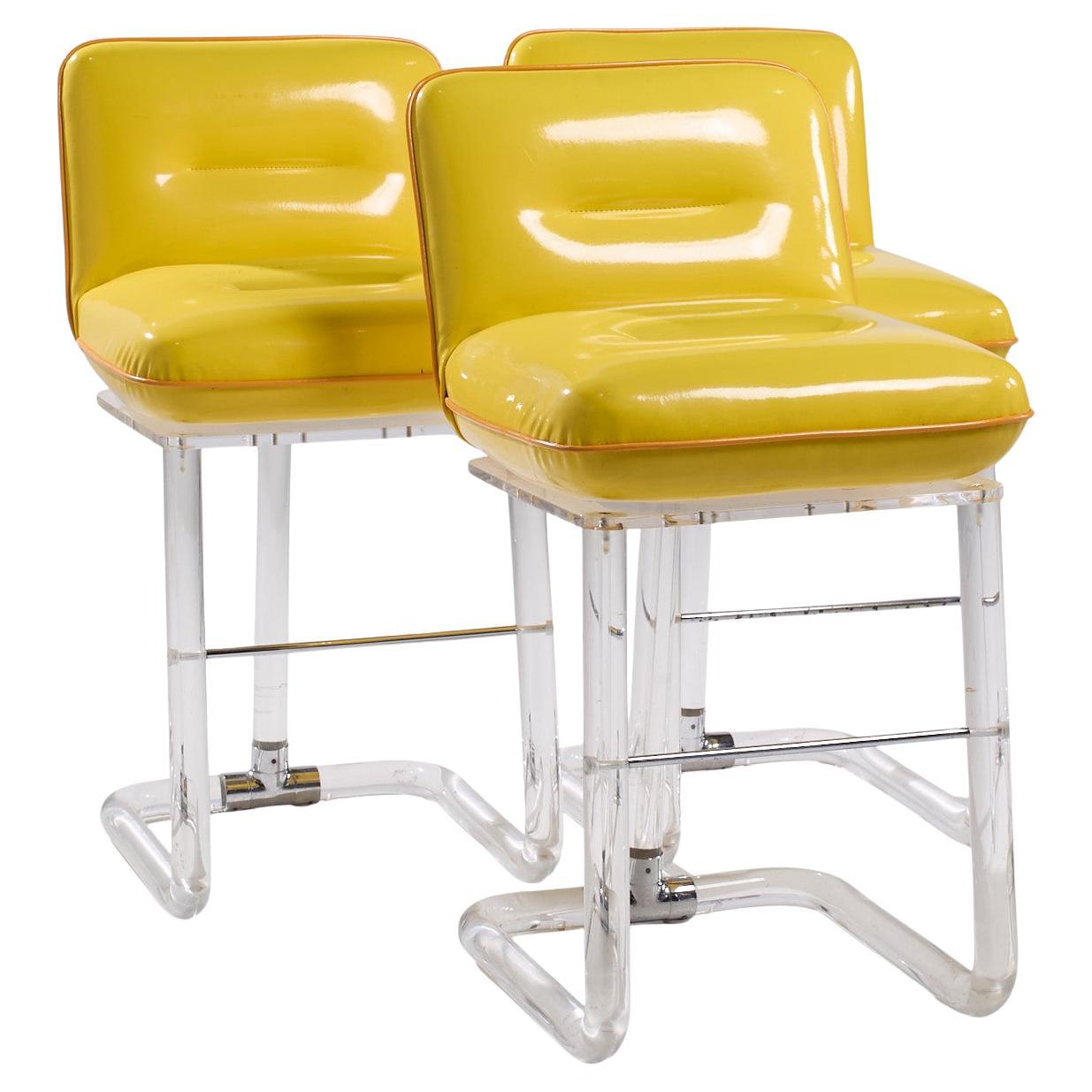 Lion in Frost Mid Century Lucite Swivel Bar Stools - Set of 3 For Sale
