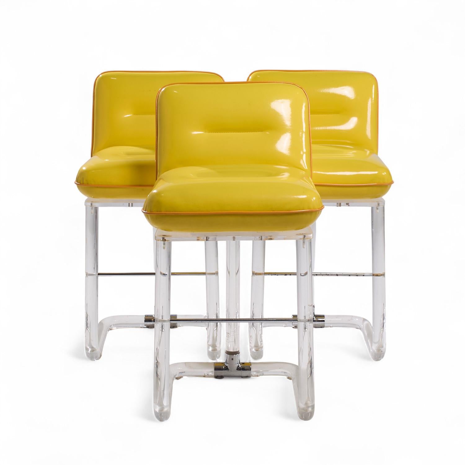 Lion in Frost Mid Century Lucite Swivel Bar Stools - Set of 3

Each bar stool measures: 18 wide x 22 deep x 35 high, with a seat height/chair clearance 26 inches

We take our photos in a controlled lighting studio to show as much detail as possible.