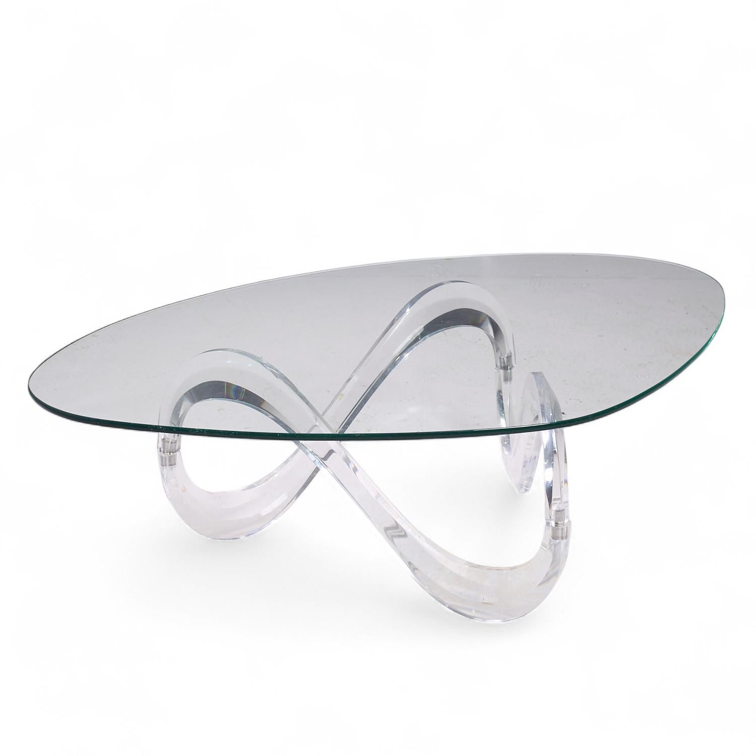 Charles Hollis Jones Mid Century Lucite Infinity Coffee Table

This coffee table measures: 52 wide x 36 deep x 15.5 inches high

We take our photos in a controlled lighting studio to show as much detail as possible. We do not Photoshop out
