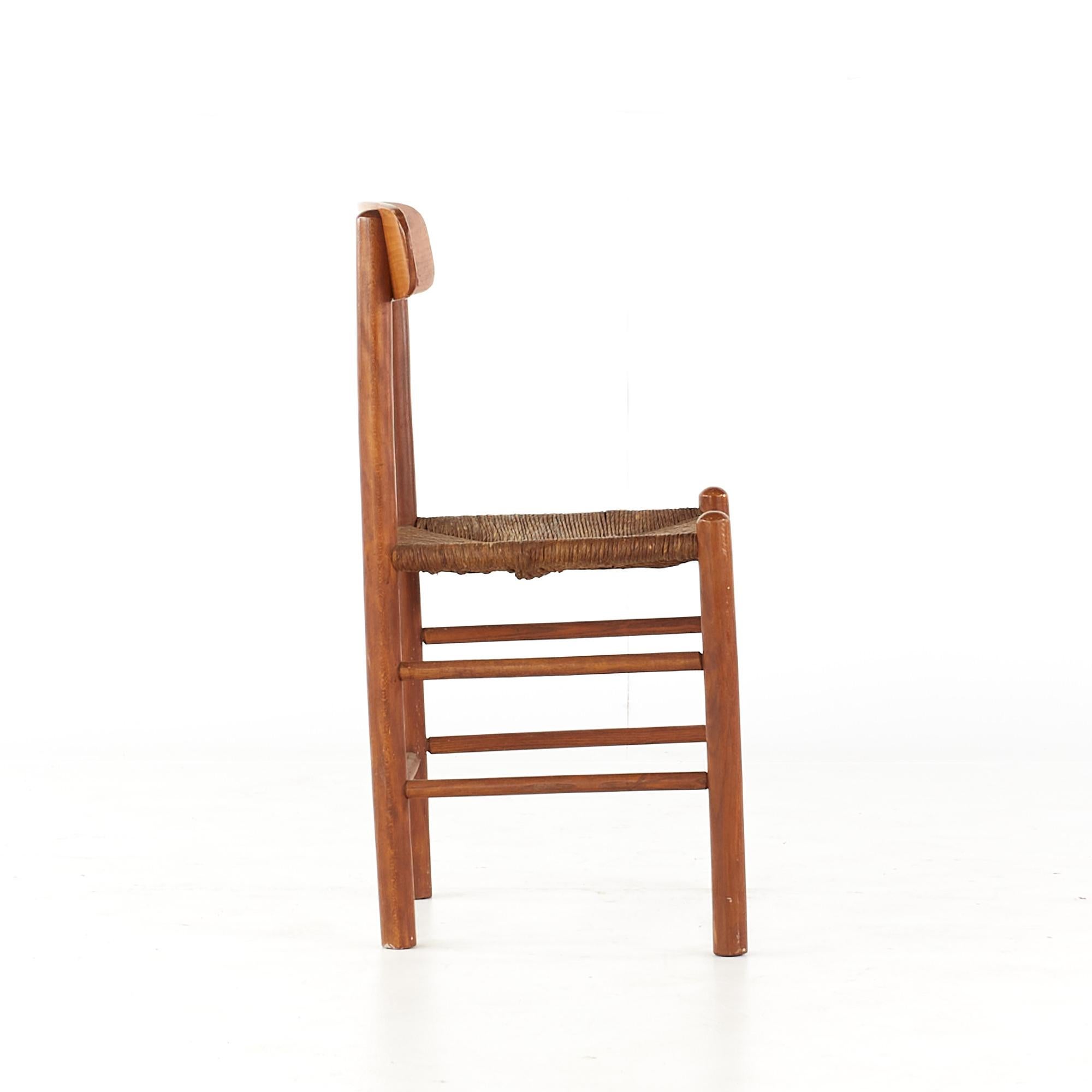 Danese Kurt Ostervig - Sedie da pranzo in teak e canna del Medioevo - Set di 4 in vendita