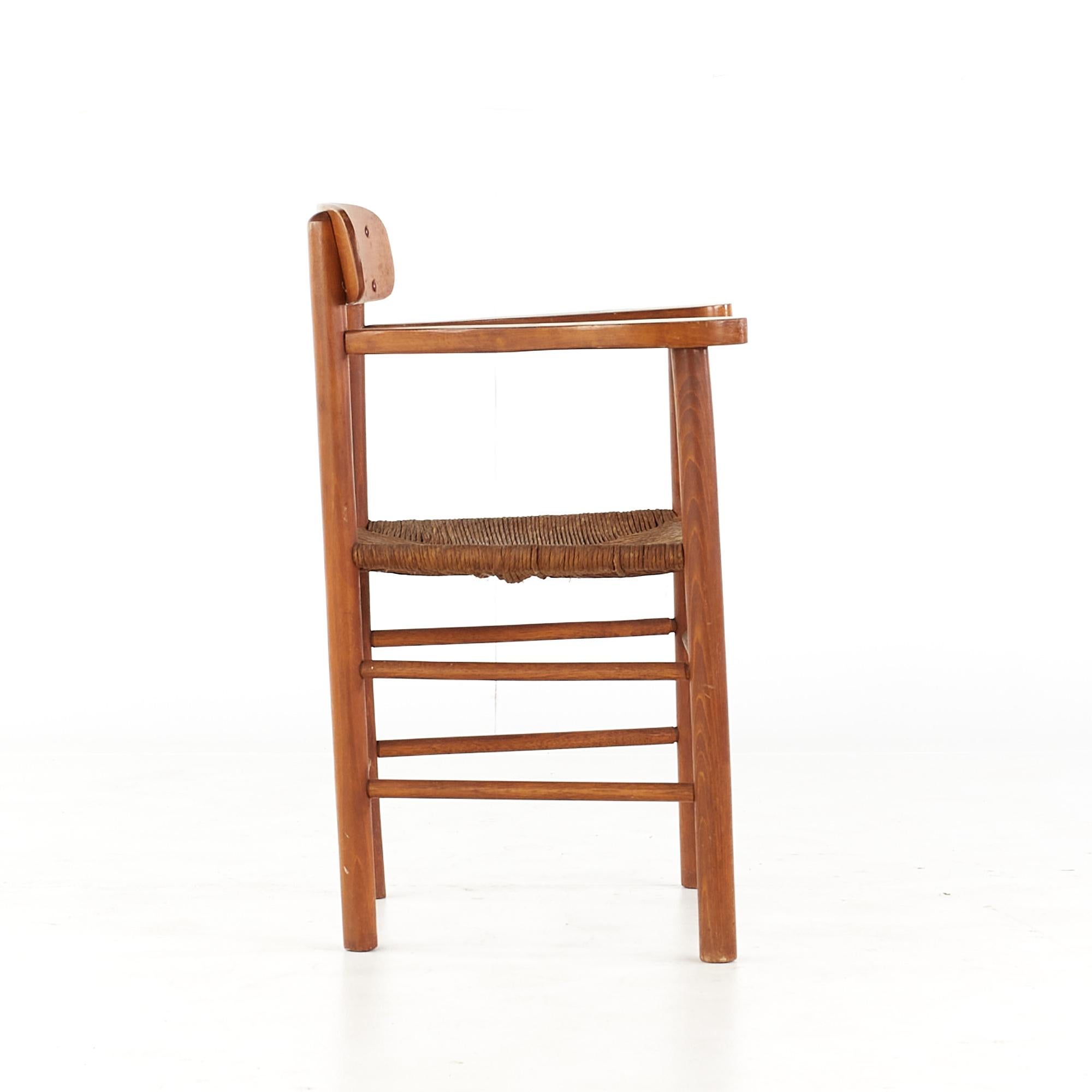 Canna Kurt Ostervig - Sedie da pranzo in teak e canna del Medioevo - Set di 4 in vendita
