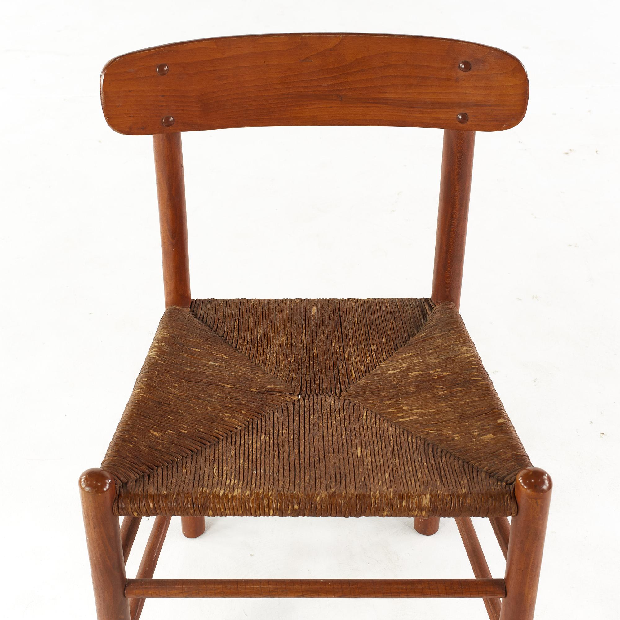 Fine XX secolo Kurt Ostervig - Sedie da pranzo in teak e canna del Medioevo - Set di 4 in vendita