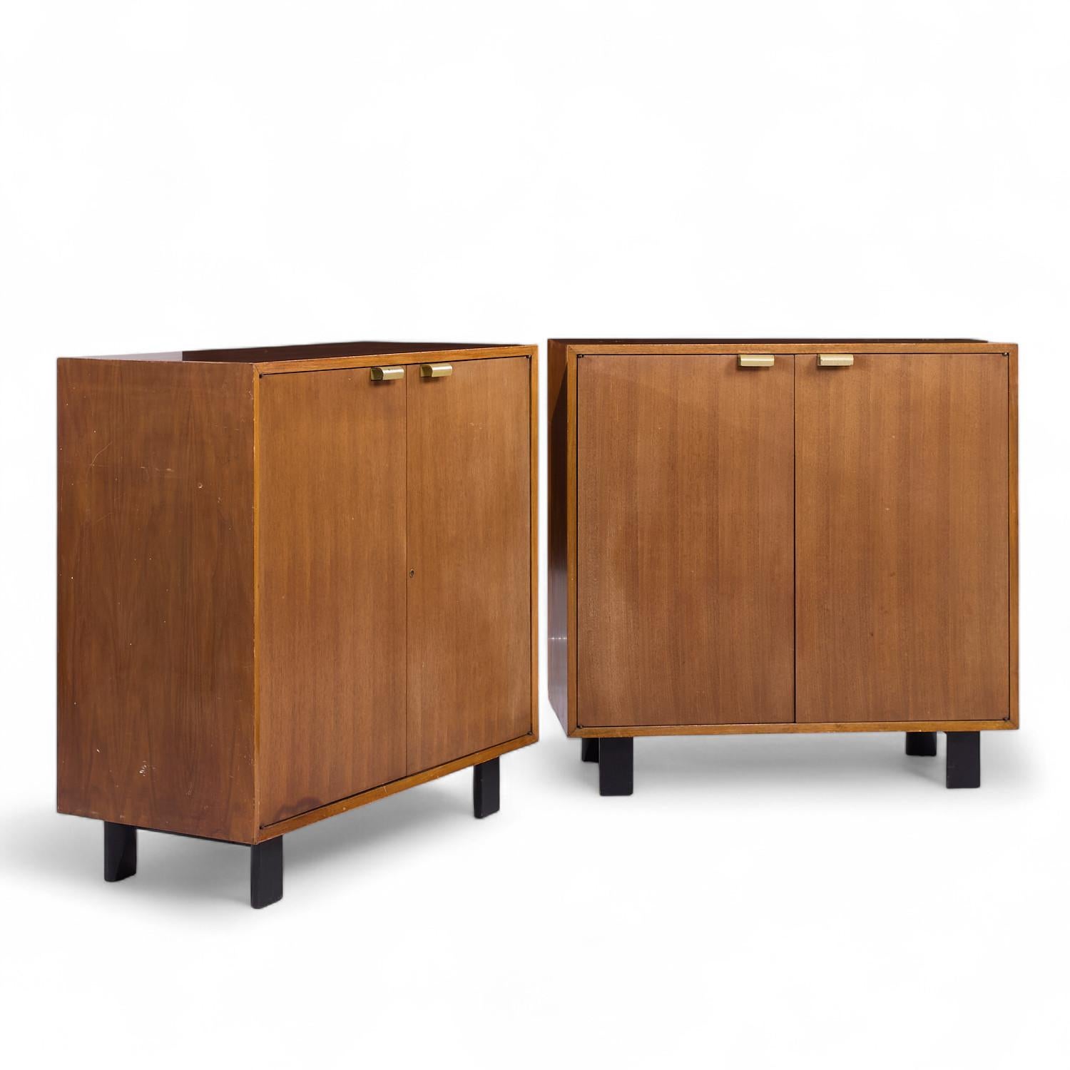 George Nelson for Herman Miller Mid Century Basic Series Walnut Two Door Cabinet - Pair

Each cabinet measures: 40 wide x 18.5 deep x 39.75 inches high

All pieces of furniture can be had in what we call restored vintage condition. That means the