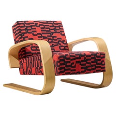 Sillón Alvar Aalto 400 Tank: sillón de madera curvada de mediados de siglo