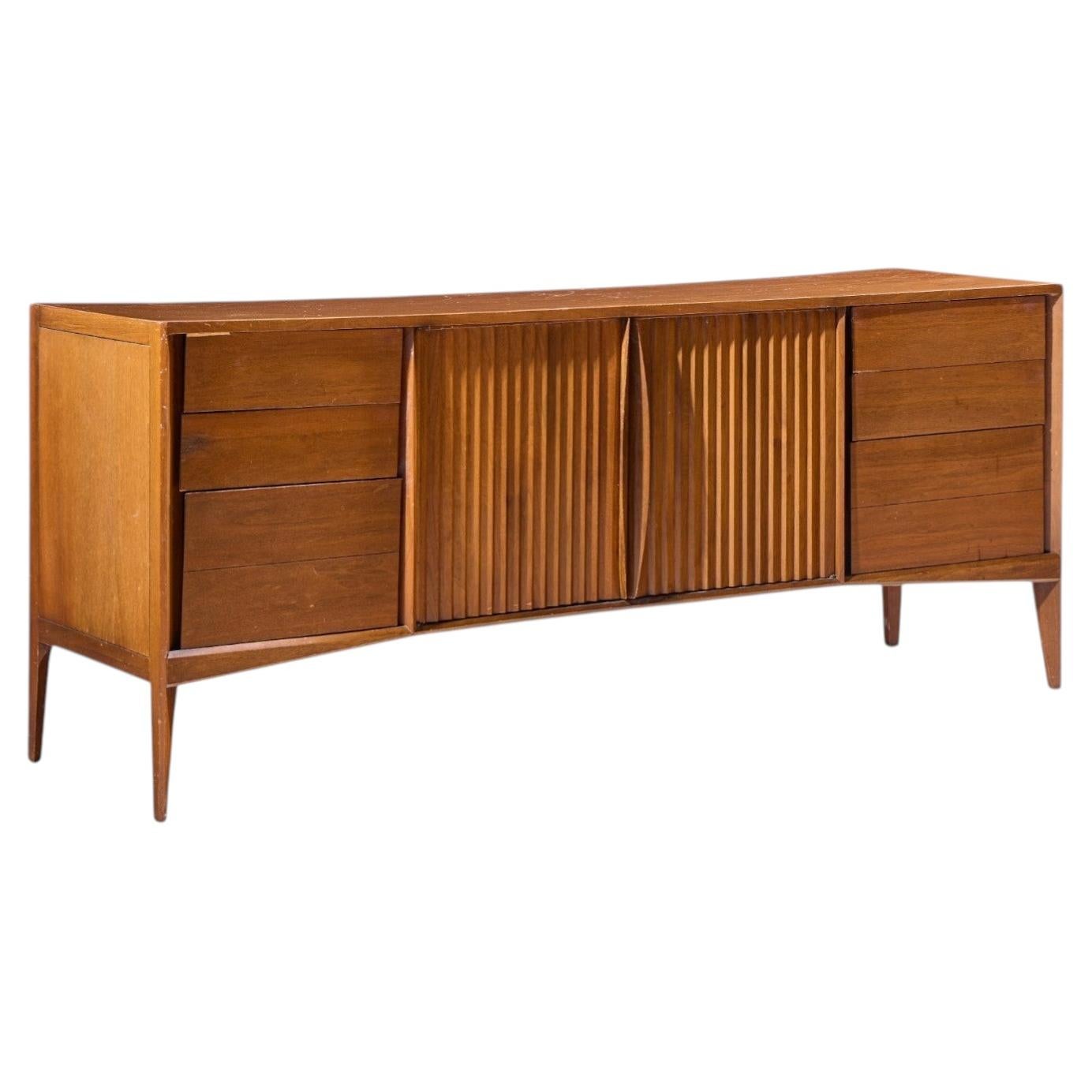 What is a curved dresser called?