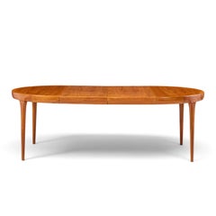 Kofod Larsen per Faarup Møbelfabrik: tavolo da pranzo danese in teak con 2 prolunghe Kofod