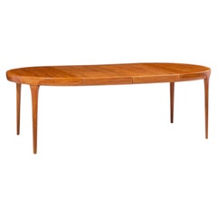 Kofod Larsen per Faarup Møbelfabrik: tavolo da pranzo danese in teak con 2 prolunghe Kofod