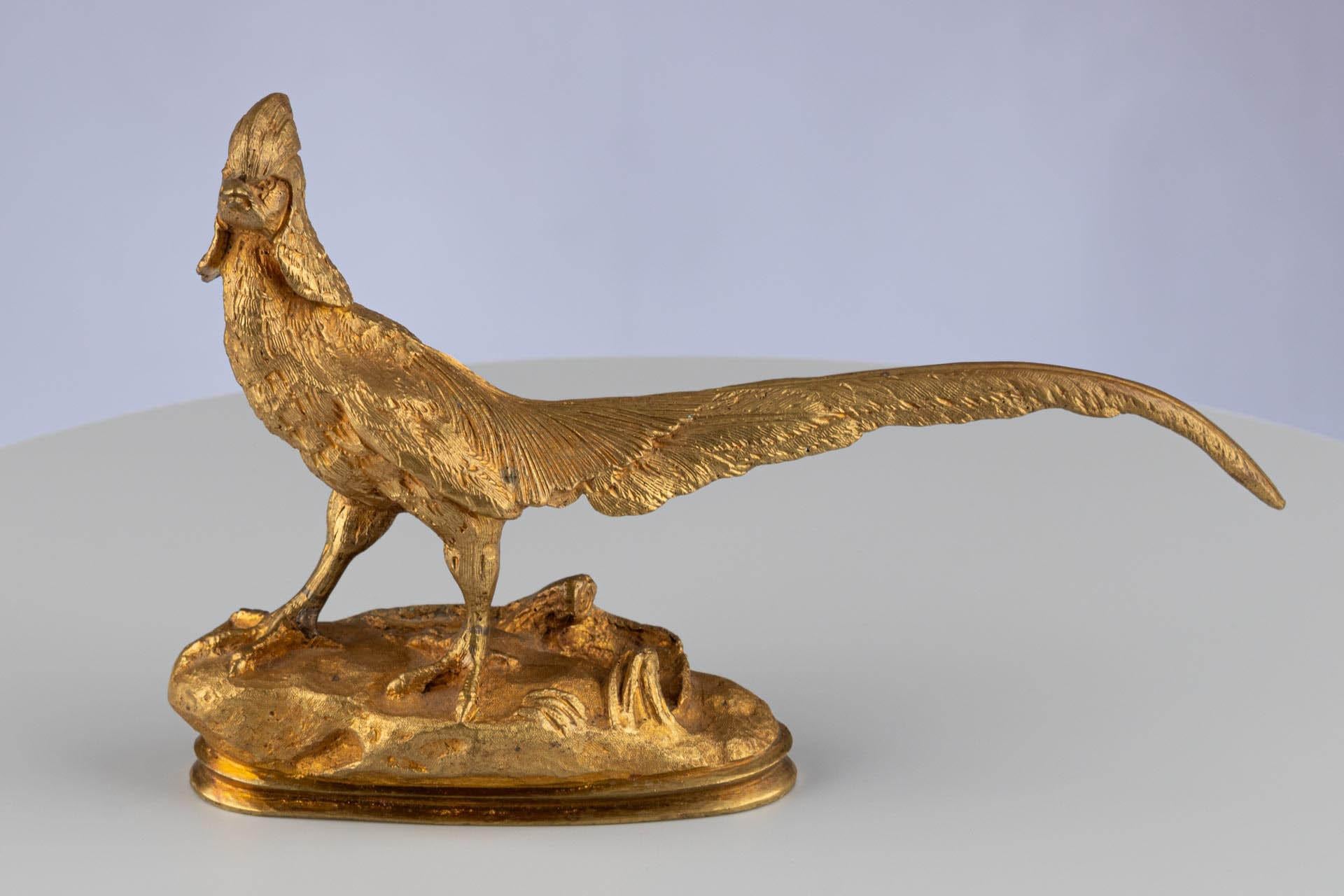 Antique French Animalier Oro Ormolu Bronzo Dorato Figura di Uccello Scultura Fagiano 

Francese 
Ormolu (bronzo dorato)
Fine del XIX secolo 

Dimensioni: H. H. x L. x P.: 13 cm. x 20 cm. x 4,5 cm.

Questa scultura antica finemente eseguita raffigura