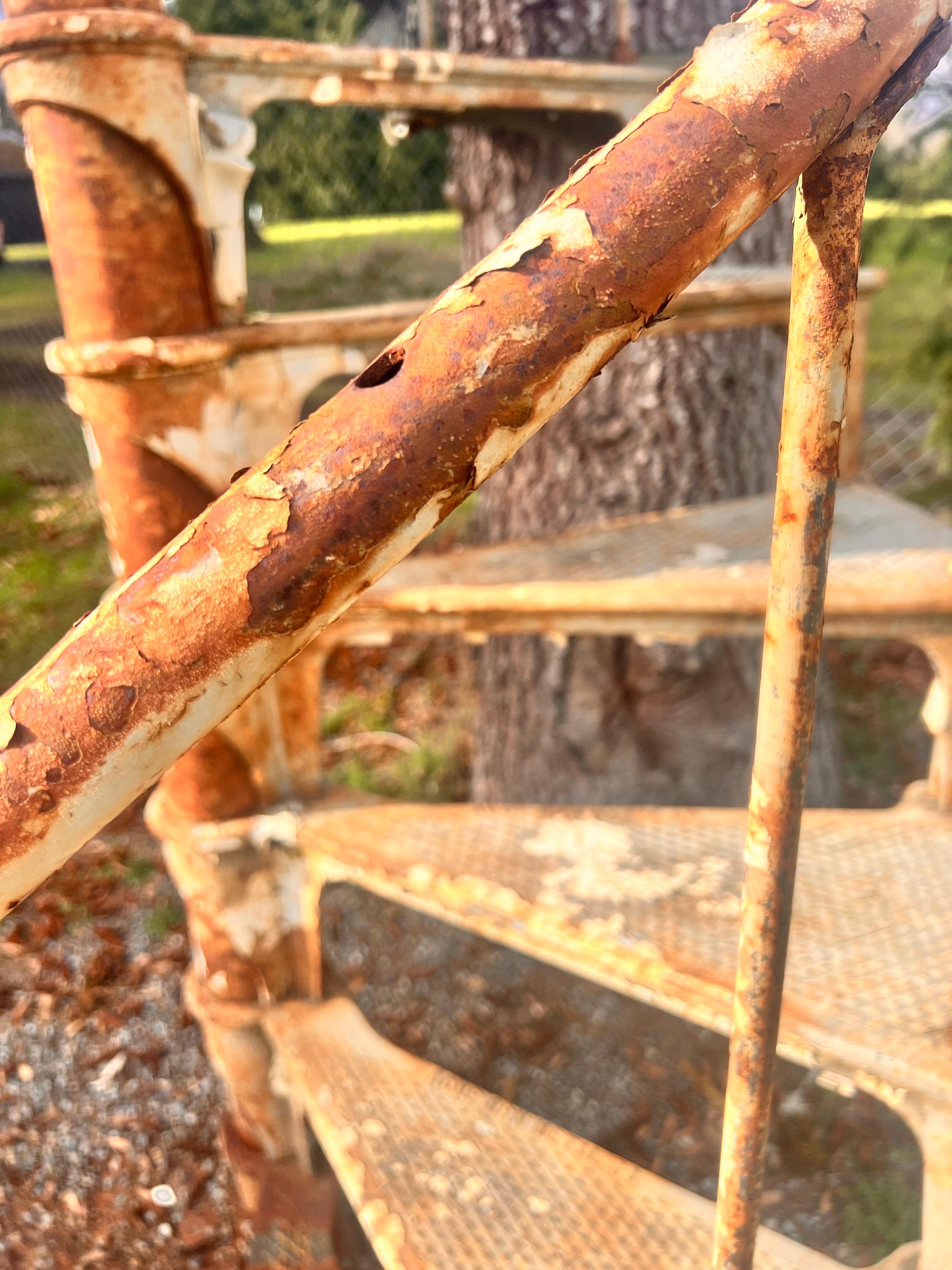 Step into history with this remarkable cast iron spiral staircase, once a part of Boeing Plant 2 a legendary factory built in 1936 in Seattle, Washington, USA. This architectural piece has a rich history tied to the production of some of the most