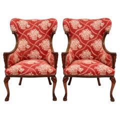 Antique French Carved Mahogany Wing Chairs in Schumacher Fabric, Pair