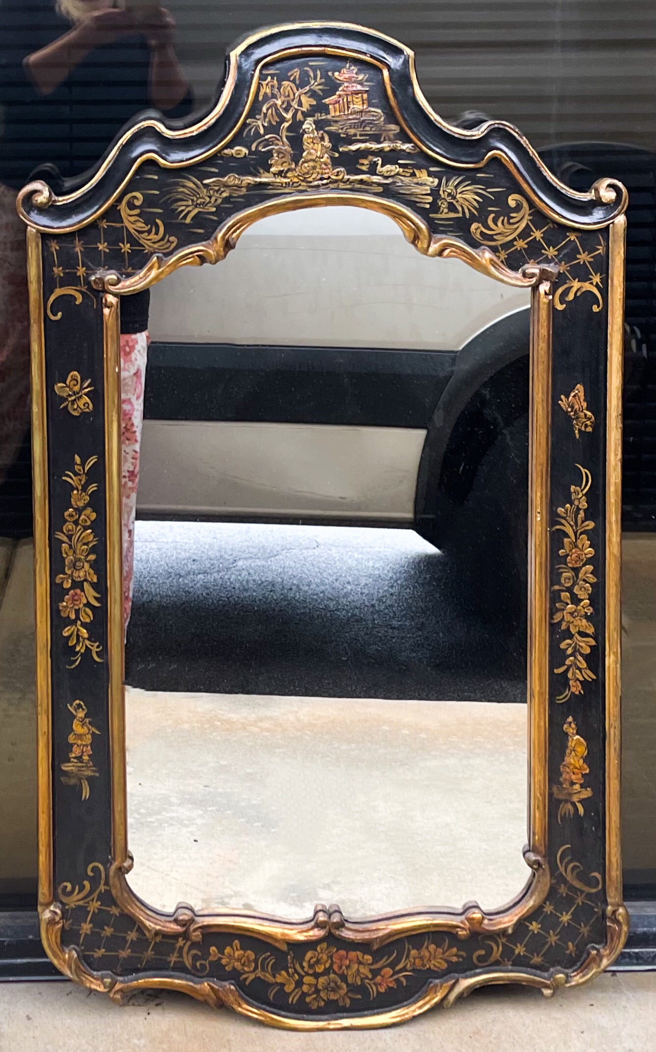 This is a 1960s Italian giltwood and black lacquer chinoiserie painted mirrors. It is unmarked and in very good condition.
