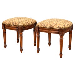 French Style Carved Fruitwood Ottomans in Needlepoint Leopard, Pair