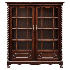Armoire-bibliothèque américaine ancienne de l'époque victorienne, en acajou sculpté, décorée de motifs en spirale