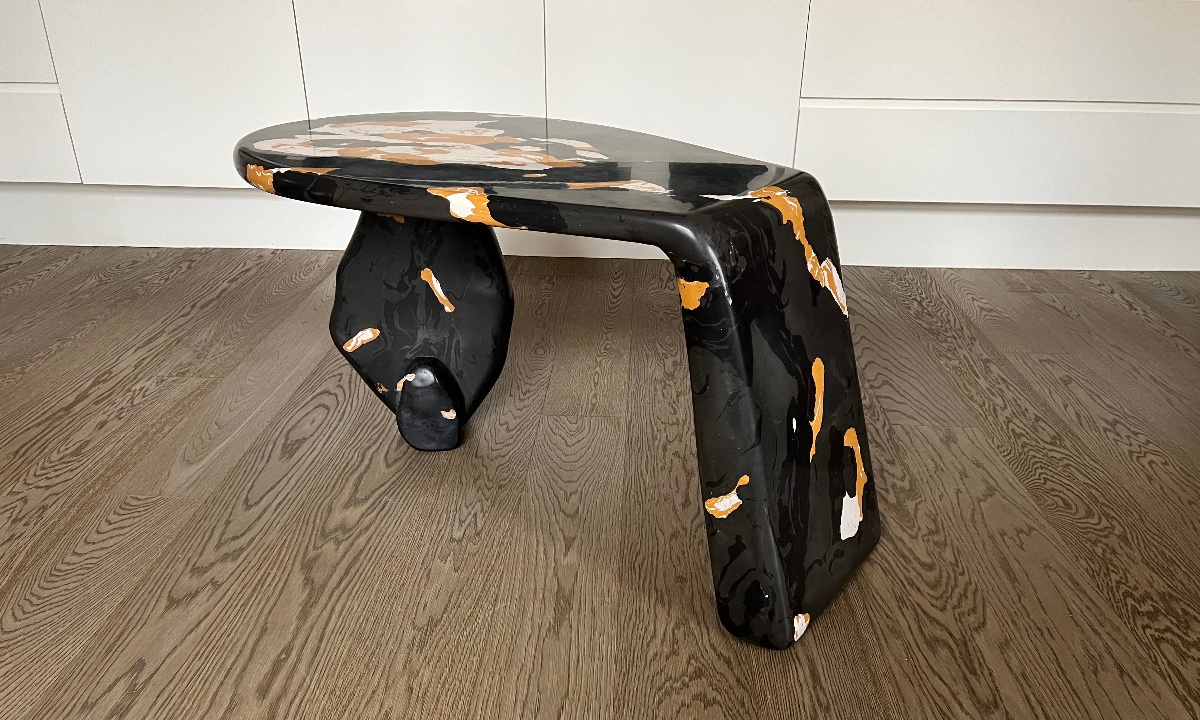 One of kind medium size coffee table, beautifully handcrafted in stucco marmo, a lengthy, laborious 15th century method that lends itself well to modern design. Inspired by the Japanese Urushi craft, the table displays striking colours of natural