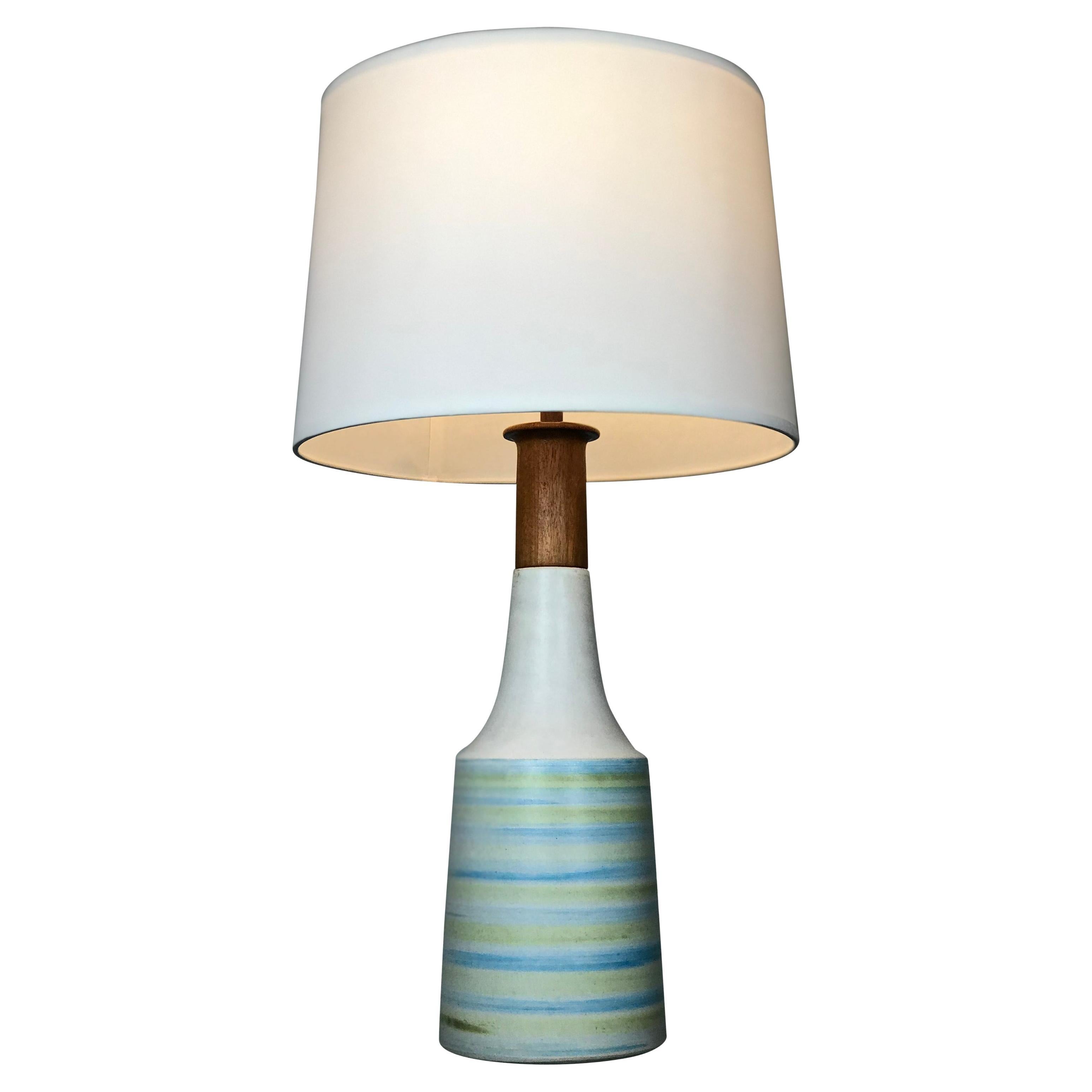 Impressive large Martz walnut and stoneware lamp with wisps of blue and green against a matte grey glaze.
Rewired - new antique finish socket with a white cord. 
*Shade is not included but it fits so well. The dimensions of the shade are: 12