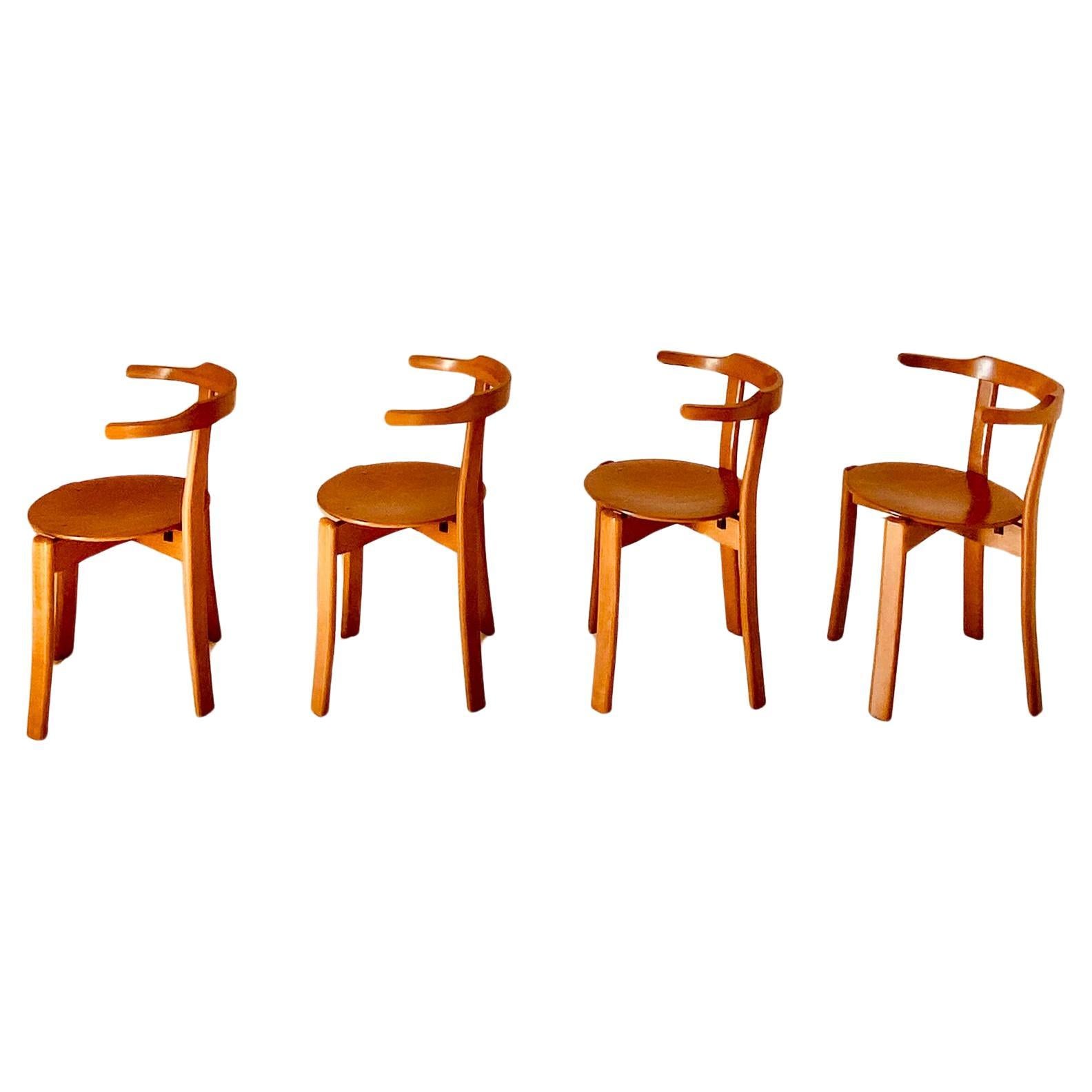 Italian Vintage wood dining chairs in the style of Bruno Rey, set of four, Italy, 1970s For Sale