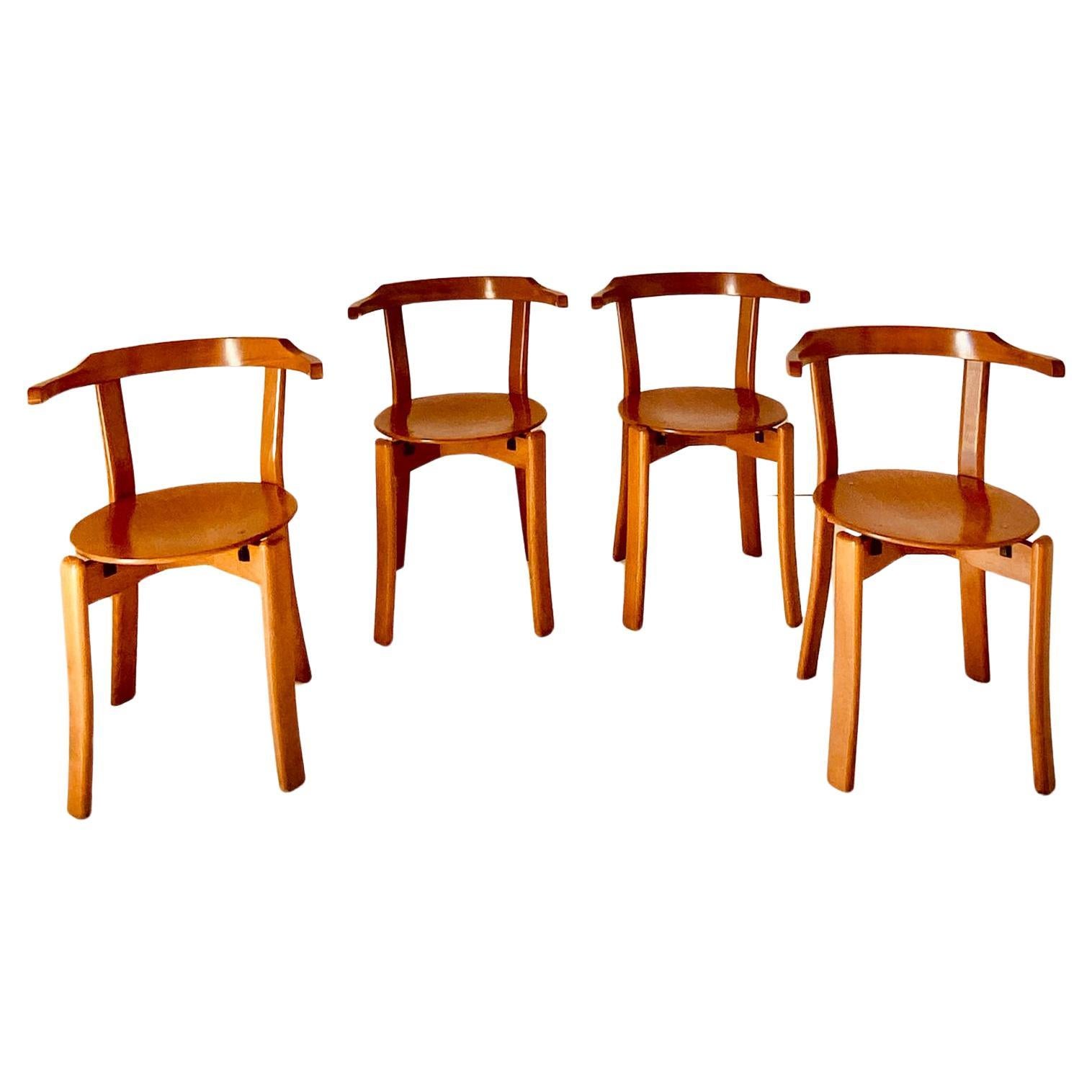 Mid-Century Modern Vintage wood dining chairs in the style of Bruno Rey, set of four, Italy, 1970s For Sale