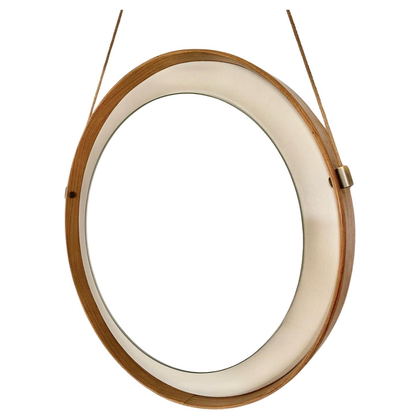Mid-Century Modern Specchio rotondo con struttura in legno ed ecopelle, Italia anni 60 For Sale