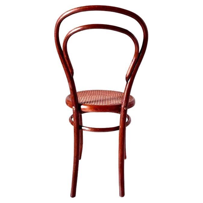Cane Bentwood and cane dining chairs, set of eight, Joseph Hofmann, Austria 1900s For Sale