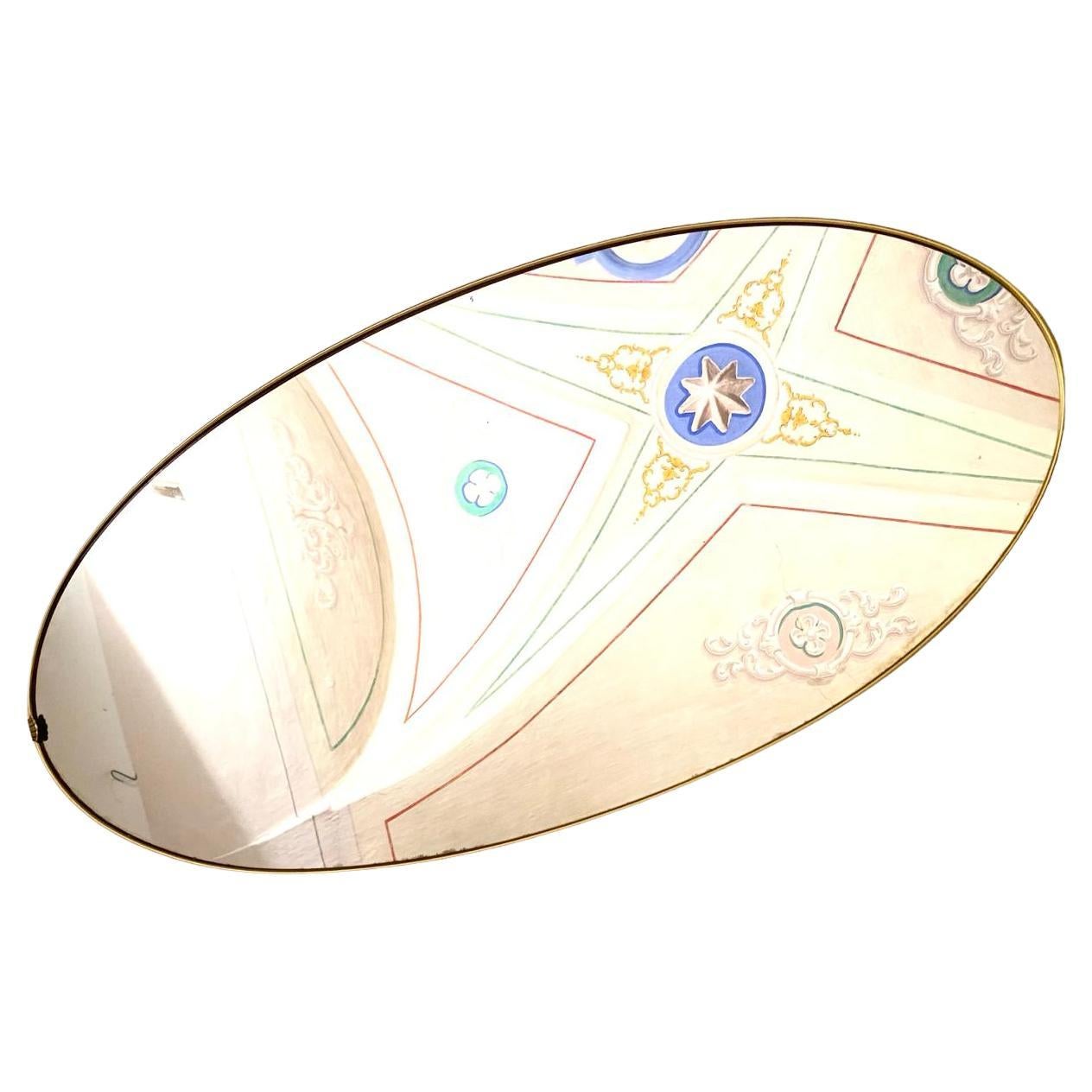 Vintage oval brass mirror in the style of Gio Ponti, Italy 1950s In Good Condition For Sale In Ceglie Messapica, IT