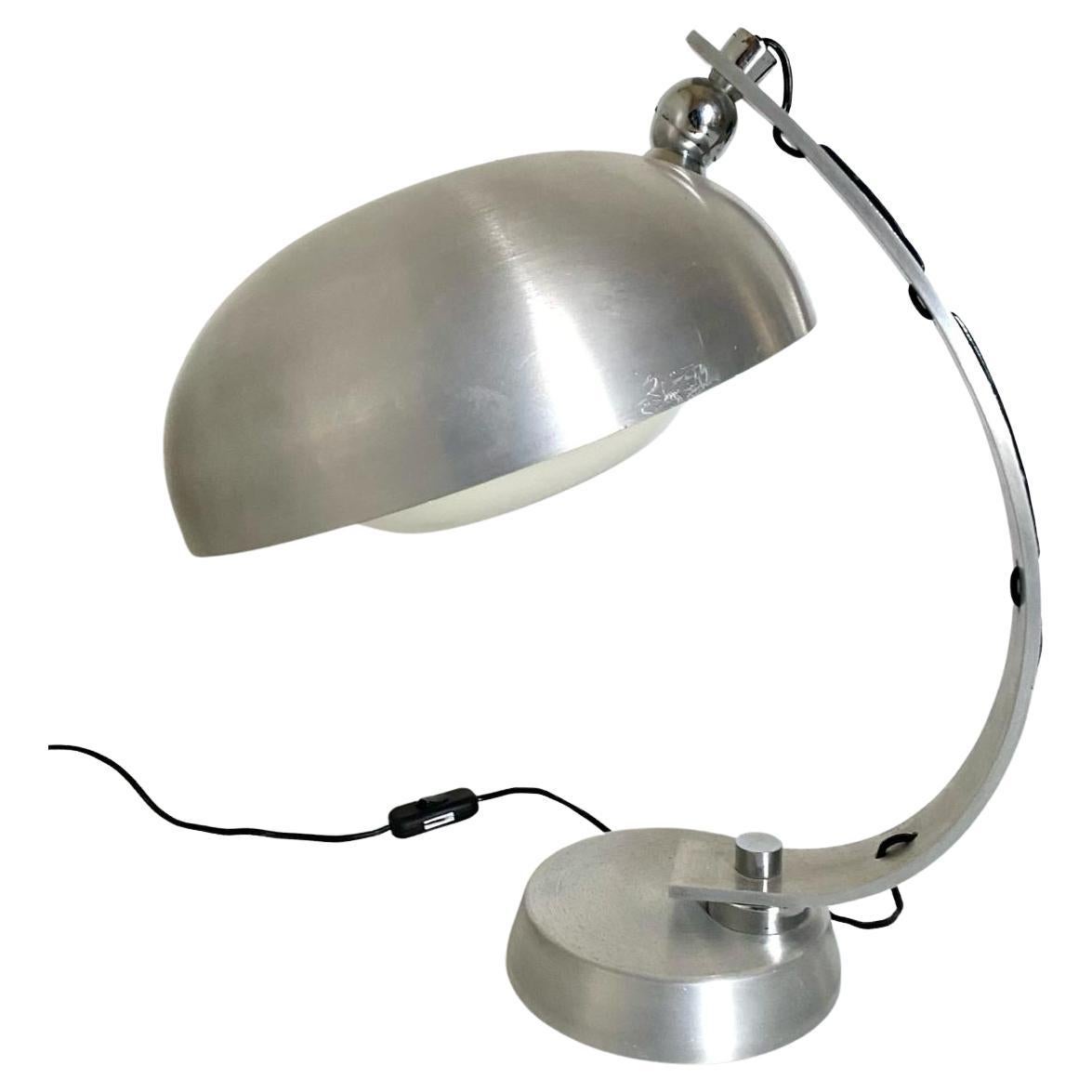 1970s vintage table lamp in industrial style. Designed by Angelo Lelli for Arredoluce in the 1970s. Aluminium structure with flexible lampshade. The lamp has been recabled whilist its structure has been refined. In really good conditions with only