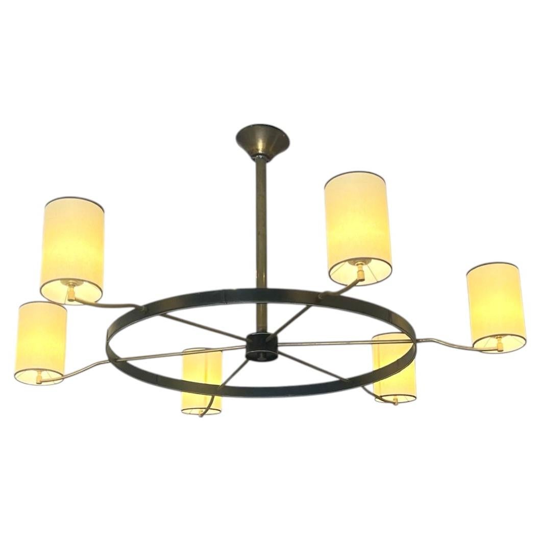 Large circular six‑light chandelier by Jacques Adnet, France, circa 1950 For Sale