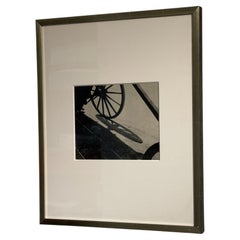 „Wheel and Shadow“ – Vintage-Heliogravüre von André Kertész