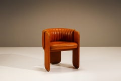 Sillón «Dinette» de Luigi Massoni para Poltrona Frau, en piel color coñac