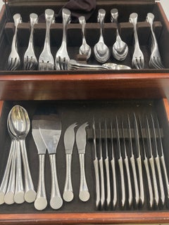 Rare Puiforcat Stainless Steel Flatware Set in Wave Pattern in Art Deco Style