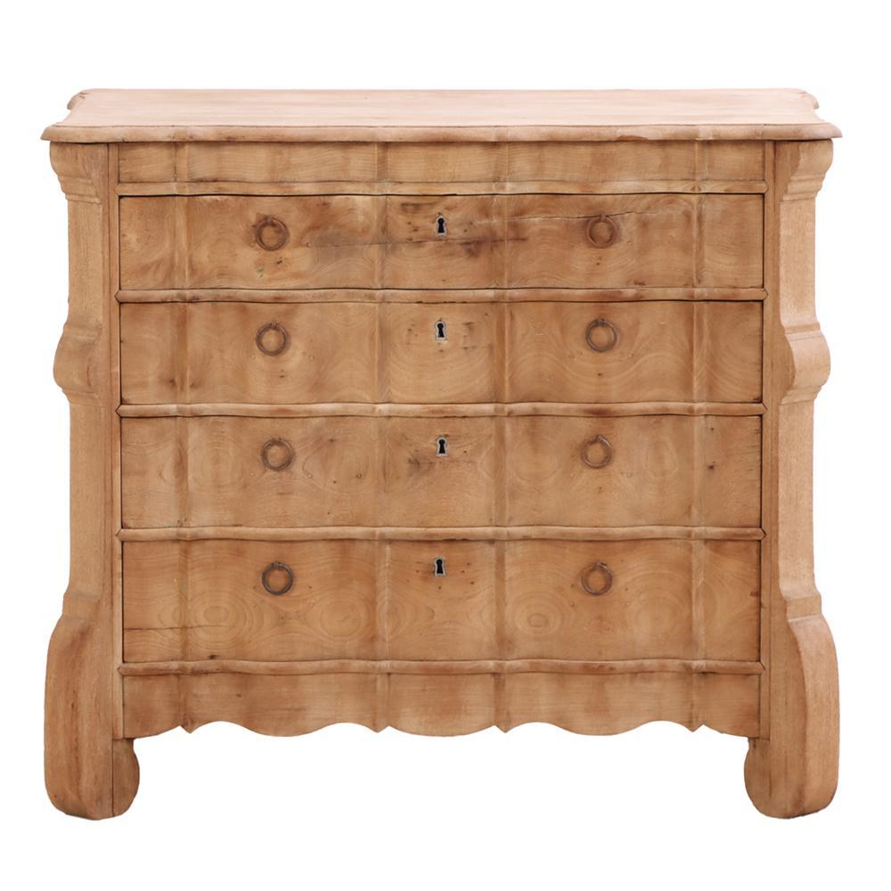 A graceful commode with a beautifully aged, stripped finish that highlights the natural warmth and grain of the wood. The commode features a classic serpentine front with three generous drawers flanked by shaped stiles. The stripped walnut finish