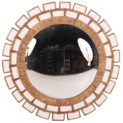 A Snow White Glass and Resin Convex "Sunburst" Mirror.